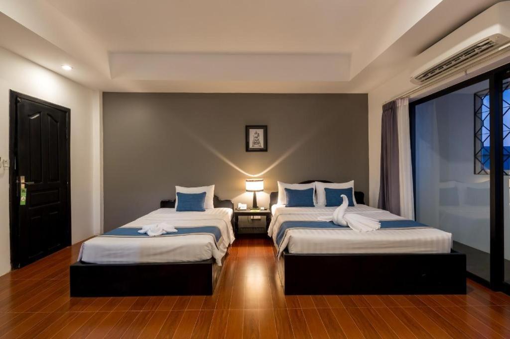 The Cyclo Siem Reap Hotel Bagian luar foto