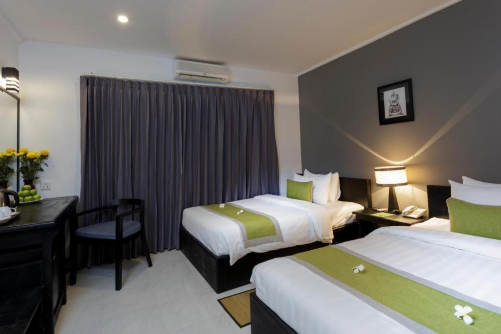 The Cyclo Siem Reap Hotel Bagian luar foto