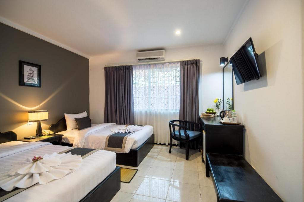 The Cyclo Siem Reap Hotel Bagian luar foto