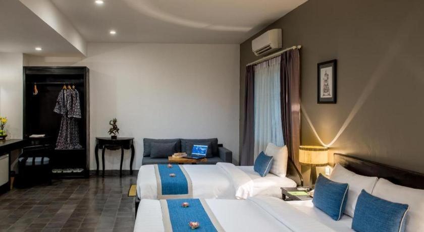 The Cyclo Siem Reap Hotel Bagian luar foto